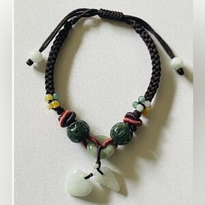 NWOT Bracelet Artisan green Jade beads heart, leaf brown & red macrame cord adj.